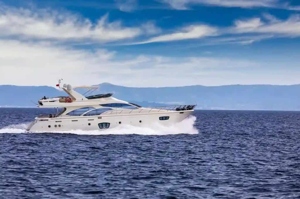 White motor yacht cruising across Banderas Bay